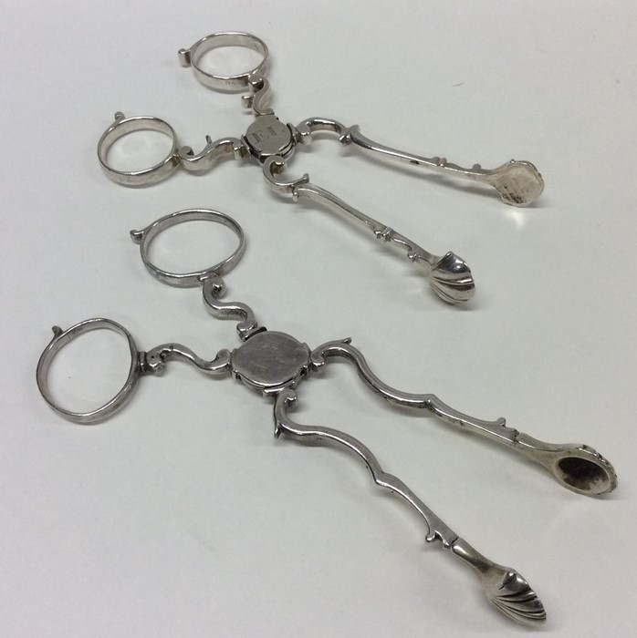 Two pairs of Georgian silver scissor action sugar - Image 2 of 2