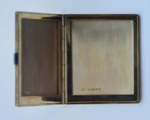 CARTIER: An unusual gold double picture frame with