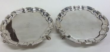 A good pair of silver waiters with pie crust edges