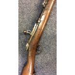 An Antique mahogany rifle with steel mechanism. By