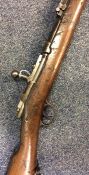 An Antique mahogany rifle with steel mechanism. By