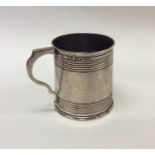 A small Victorian silver christening cup of taper