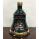 1 x 70cl bottle of Bell's Old Scotch Whisky in green Wade bell shaped