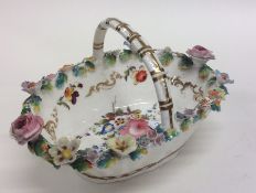 An English porcelain Coalbrookdale style basket mo