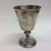 An unusual crested tapering silver goblet with gil