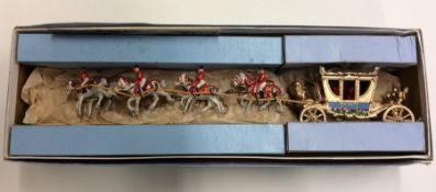 A boxed cast metal model of the Royal Coach and ho