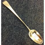 A silver OE pattern basting spoon. London. By RC.
