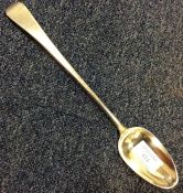 A silver OE pattern basting spoon. London. By RC.