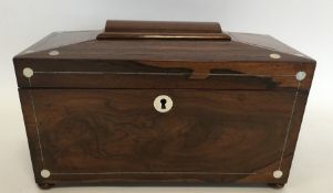 A good rosewood and MOP tea caddy with fitted inte