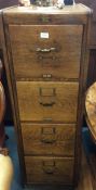 An oak four drawer filing cabinet. Est. £150 - £20