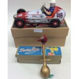 A SCHYLLING wind-up Sprint Racer in box together w