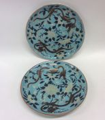 A pair of Chinese floral plates attractively decor