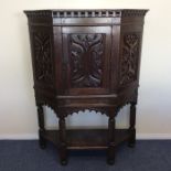 A good oak Jacobean style court cupboard on stand