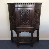 A good oak Jacobean style court cupboard on stand