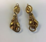 A pair of large diamond drop earrings decorated wi