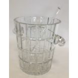 A heavy large cut glass wine cooler together with