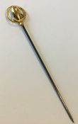 CHARLES HORNER: A small gold mounted stick pin. Ap