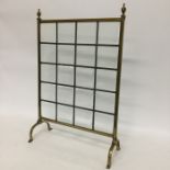 A lead glazed brass fire screen together with one