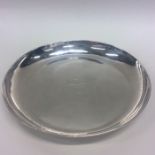 A George I circular silver strawberry dish, the ce