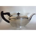 A heavy Art Deco silver teapot on pedestal base wi
