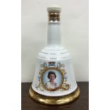 1 x 75cl bottle of Bell's Scotch Whisky in a cream coloured bell-shaped