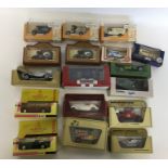 A box containing various boxed die-cast vehicles t