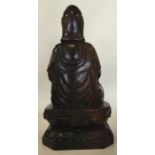 A large Chinese carved figure of a seated Buddha o