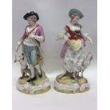 A pair of Continental porcelain figures finely model
