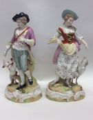 A pair of Continental porcelain figures finely model
