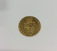 A George III 1794 gold Guinea. Est. £250 - £300.