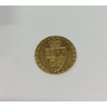 A George III 1794 gold Guinea. Est. £250 - £300.