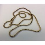 A 9 carat snake link necklace with barrel clasp. A