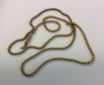 A 9 carat snake link necklace with barrel clasp. A