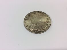 A 1780 Continental coin with crested centre. Est.