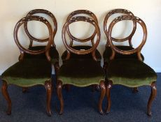 A good set of six mahogany dining chairs with scro