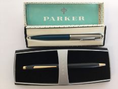 A boxed Parker pen together with two other Cross p