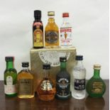 A boxed selection of nine miniature bottles of spirits to include