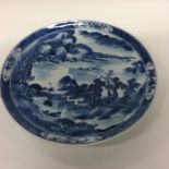 A 19th Century blue and white Chinese wall plate d