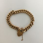 A good quality 15 carat gold curb link bracelet wi