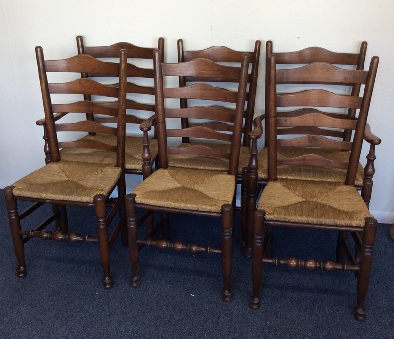 A set of six oak country chairs with cane seats an