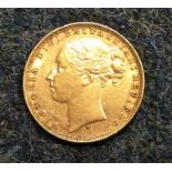An 1877 Victorian sovereign. Est. £150 - £200.