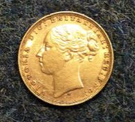 An 1877 Victorian sovereign. Est. £150 - £200.