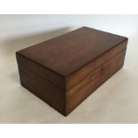A mahogany sewing box with fitted interior togethe