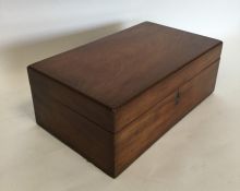 A mahogany sewing box with fitted interior togethe