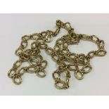 A good quality French 18 carat chain with ring cla