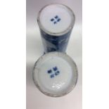 A pair of tall cylindrical prunus pattern vases de