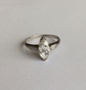 An attractive marquise single stone ring, the cent