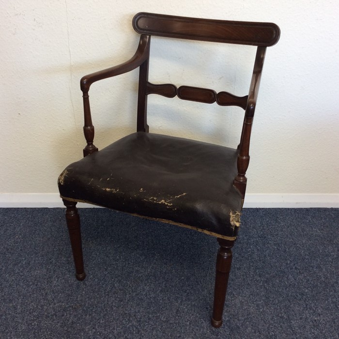 A Georgian mahogany carver chair on tapering suppo
