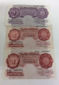 A Bank of England purple 10 Shilling note together