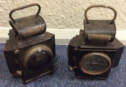 A good pair of painted railway lamps. Est. £40 - £60.